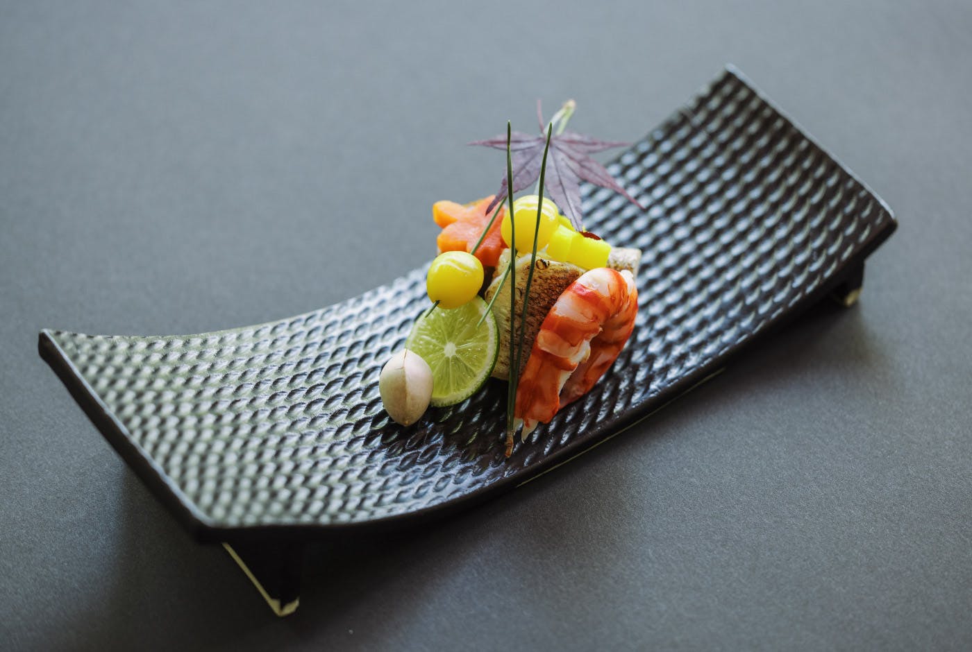 Yellowtail pressed sushi, tiger prawn, simmered sweetfish with roe in sweet soy sauce