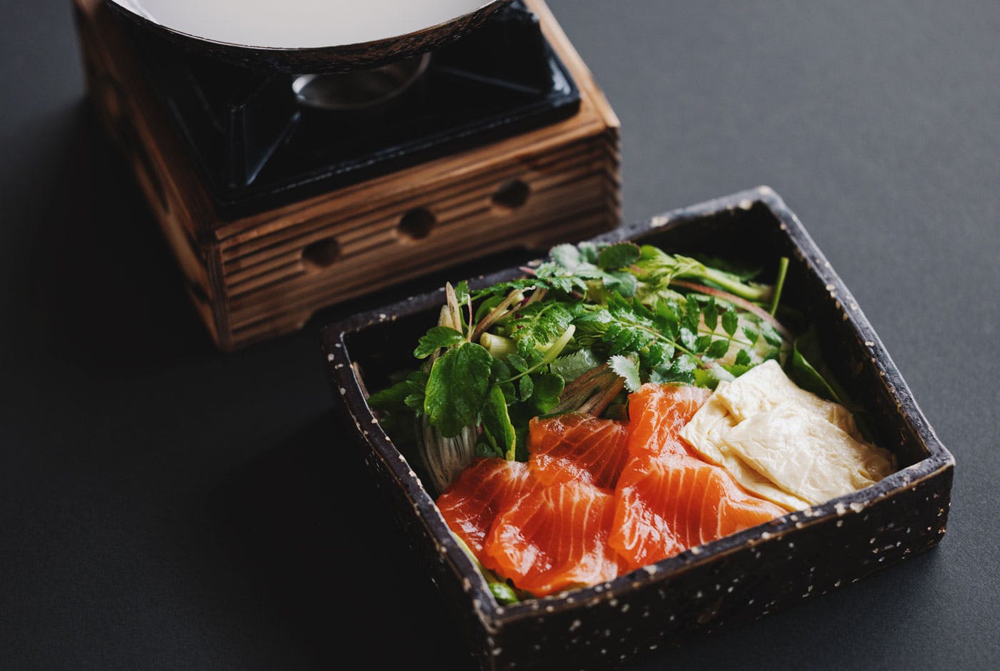 Hot pot with cherry salmon and fresh vegetable